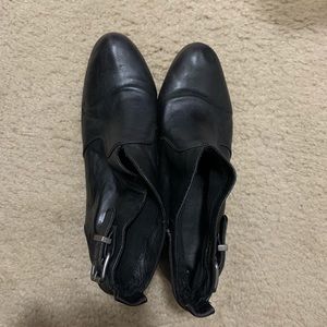 Black leather booties with side buckle